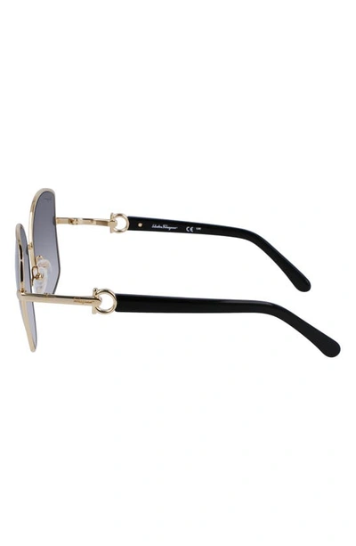 Shop Ferragamo Gancini 57mm Gradient Oval Sunglasses In Gold/ Grey Gradient