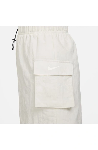 Shop Nike Sportswear Essential Woven High Waist Shorts In Light Orewood Brown/ Sail