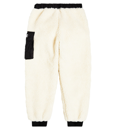 Shop Moschino Faux Shearling Sweatpants In White