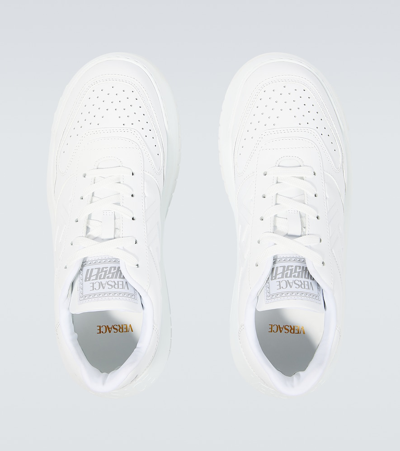 Shop Versace Greca Odissea Leather Sneakers In White
