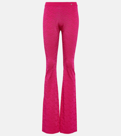 Shop Versace La Greca High-rise Flared Pants In Pink