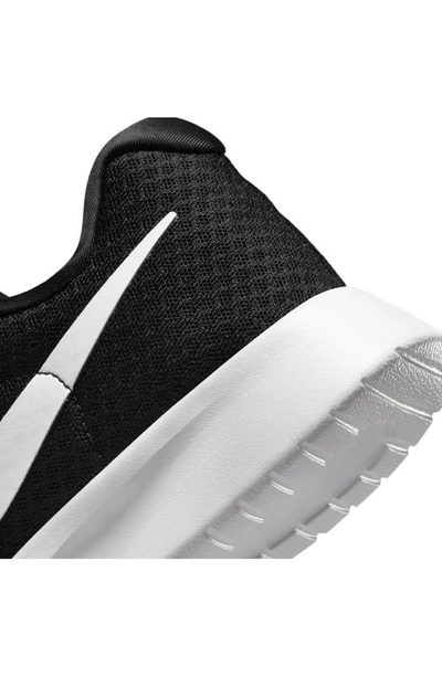 Shop Nike Tanjun Ease Shoe In Black/ White-volt-black