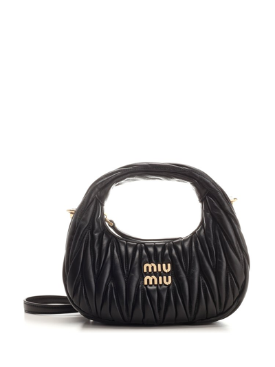 Shop Miu Miu Logo Lettering Zipped Shoulder Bag In Black