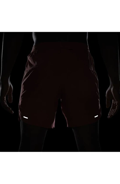 Shop Nike Dri-fit Stride 7-inch Brief-lined Running Shorts In Adobe/ Red Stardust