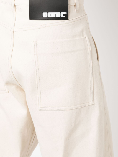 Shop Oamc Cortes Wide-leg Jeans In Neutrals