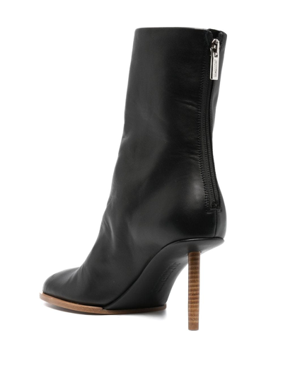 Jacquemus Black Asymmetrical Ankle Boots In Black