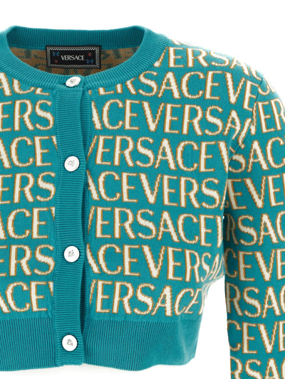 Shop Versace All Over Logo Knit Cardigan In Blue