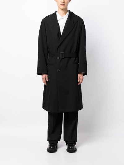 Shop Yohji Yamamoto Belted Hooded Wool Trench Coat In Black