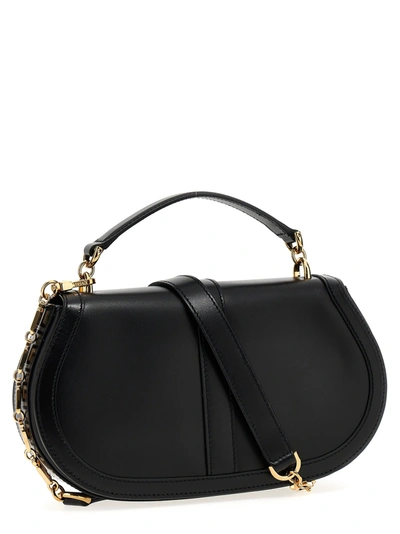 Shop Versace Greca Hand Bags Black