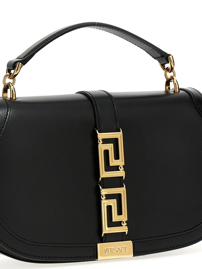 Shop Versace Greca Hand Bags Black