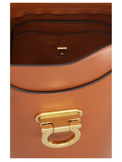 Shop Ferragamo 'trifolio' Bucket Bag In Brown