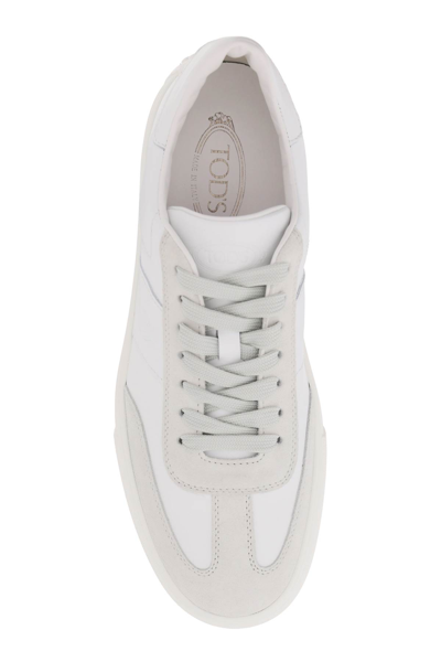 Shop Tod's Leather Sneakers In Altraversione (white)