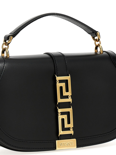 Shop Versace Greca Handbag In Black