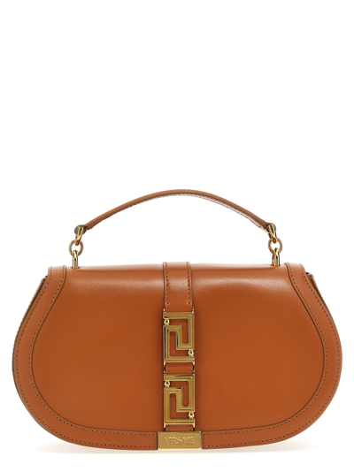 Shop Versace Greca Handbag In Beige