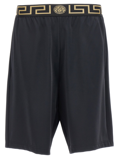 Shop Versace Greca Bermuda Shorts In Black