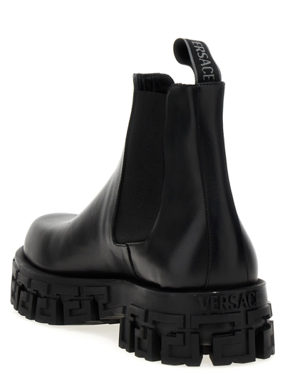 Shop Versace Greca Ankle Boots In Black