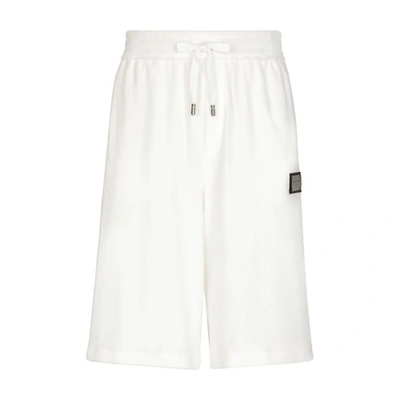 Shop Dolce & Gabbana Jersey Sweat Shorts With Logo Plaque In White