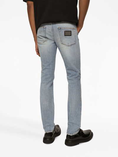 Shop Dolce & Gabbana Ripped-detailing Skinny Jeans In Blue