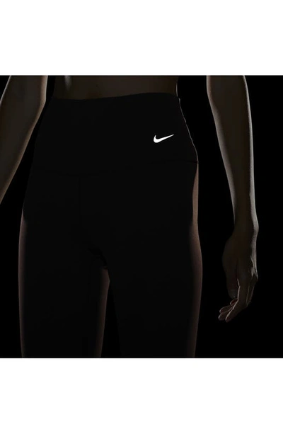 Shop Nike Zenvy Gentle Support High Waist Crop Leggings In Earth/black