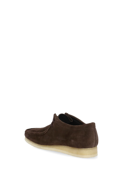Shop Clarks Wallabe Loafers In Brown