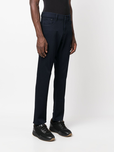 Shop Ralph Lauren Purple Label Mid-rise Slim-fit Jeans In Blue