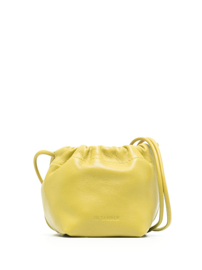 Shop Jil Sander Debossed-logo Leather Bucket Bag In Green