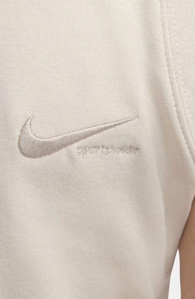 Shop Nike Sportswear Mock Neck Crop Top In Light Orewood/ Brown