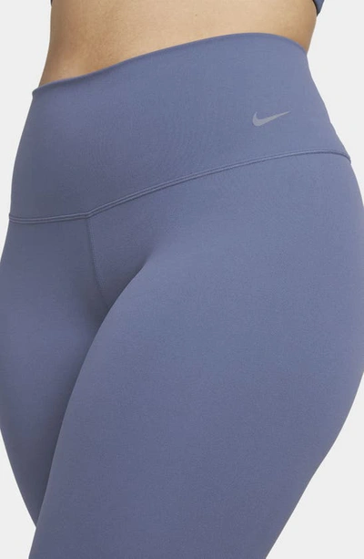 Shop Nike Zenvy Gentle Support High Waist Crop Leggings In Diffused Blue/black