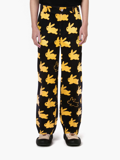 Shop Jw Anderson All Over Bunny Straight Leg Corduroy Trousers In Black
