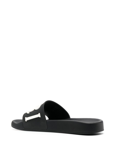 Shop Amiri Logo-embossed Faux-leather Slides In Black