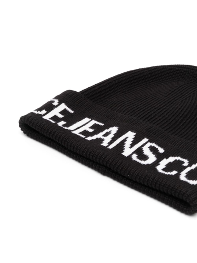 Shop Versace Jeans Couture Intarsia-logo Ribbed Beanie In Black