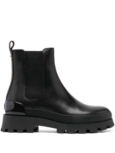 Shop Michael Kors Logo-embossed Leather Ankle Boots In Black