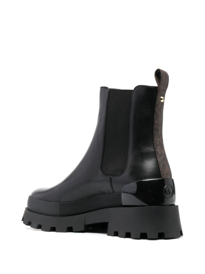 Shop Michael Kors Logo-embossed Leather Ankle Boots In Black