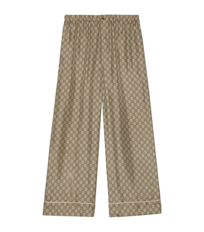 Shop Gucci Silk Gg Supreme Trousers In Brown