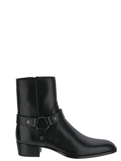 Shop Saint Laurent Wyatt Harness Boots In Smooth Leather In Black