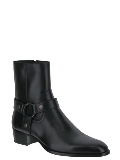 Shop Saint Laurent Wyatt Harness Boots In Smooth Leather In Black