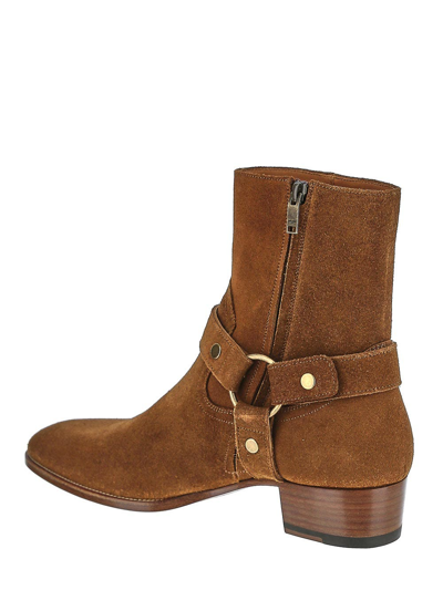 Shop Saint Laurent Wyatt Harness Boots In Suede In Brown