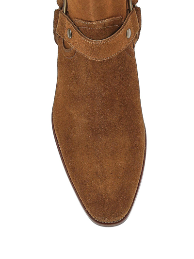 Shop Saint Laurent Wyatt Harness Boots In Suede In Brown