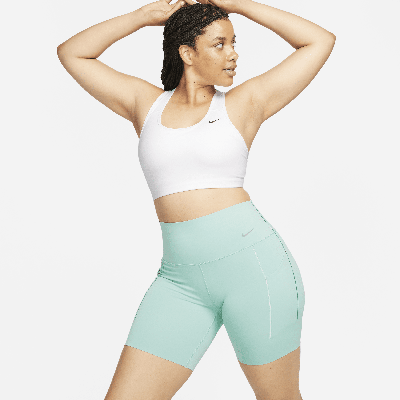 Shop Nike Women's Universa Medium-support High-waisted 8" Biker Shorts With Pockets In Green