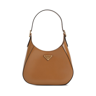 Shop Prada Logo Plaque Shoulder Bag In Brown