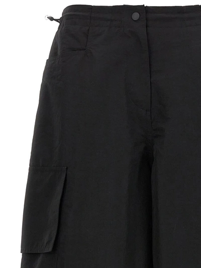 Palm Angels Wide-leg Nylon Parachute Pants With Adjustable Cuffs In Black