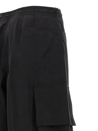 Palm Angels Wide-leg Nylon Parachute Pants With Adjustable Cuffs In Black