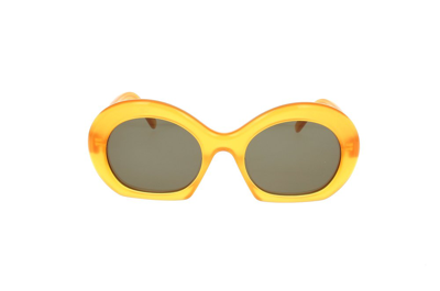 Shop Loewe Round Frame Sunglasses In Yellow