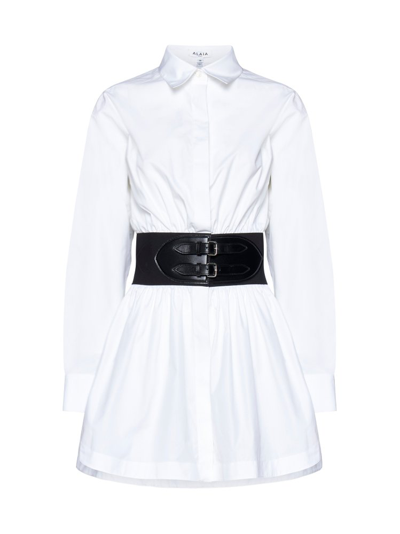 Shop Alaïa Long Sleeved Belted Flared Poplin Shirt In White
