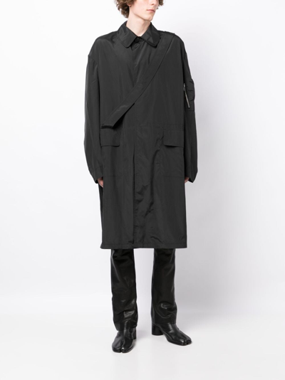 Shop Random Identities Strap-detail Midi Raincoat In Black