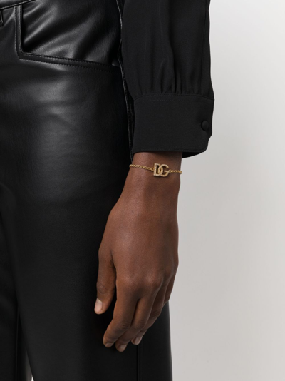 Shop Dolce & Gabbana Logo-charm Crystal-embellished Bracelet In Gold