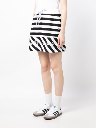 Shop Pearly Gates Logo-print Striped Miniskirt In Black