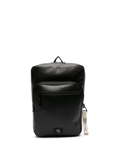 Shop Calvin Klein Jeans Est.1978 Logo-tag Leather Backpack In Black