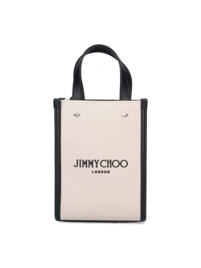 Shop Jimmy Choo Clutch In Beige