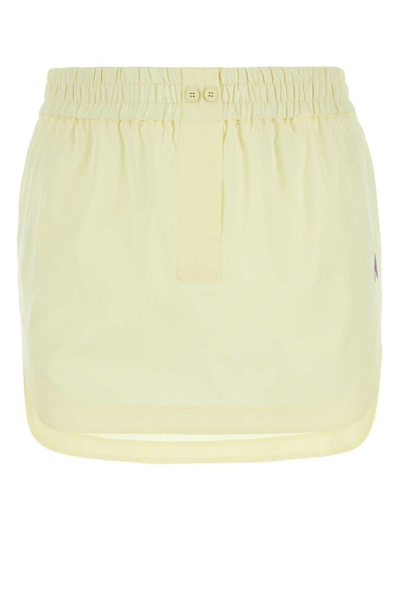 Shop Attico The  Rooney Curved Hem Mini Skirt In Yellow
